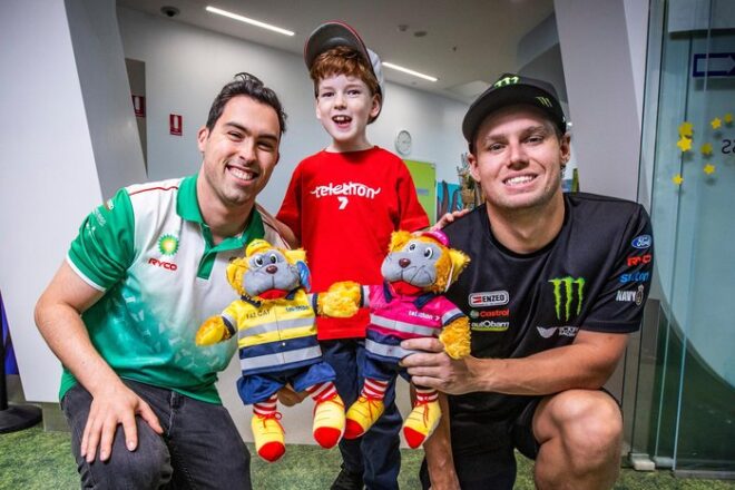 Supercar drivers Thomas Randle and Cameron Waters make pitstop at Perth Children’s Hospital to race sick kids